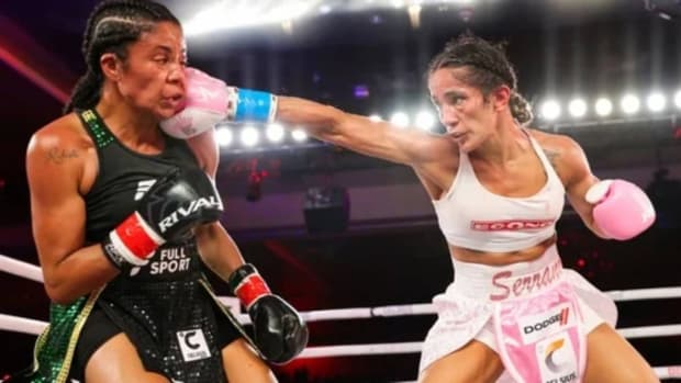 Amanda Serrano punches the face of Danila Ramos during the MVP boxing match. Serrano will square off against Nina Meinke  on Saturday, March 2, in the historic Coliseo de Puerto Rico in San Juan, Puerto Rico. ALEX MENENDEZ/GETTY IMAGES.